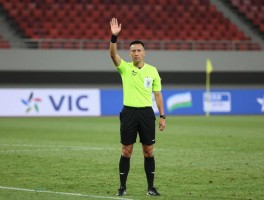 国足乌兹别克边裁,执法风格如何,历史战绩是否影响判罚,为何不启用VAR